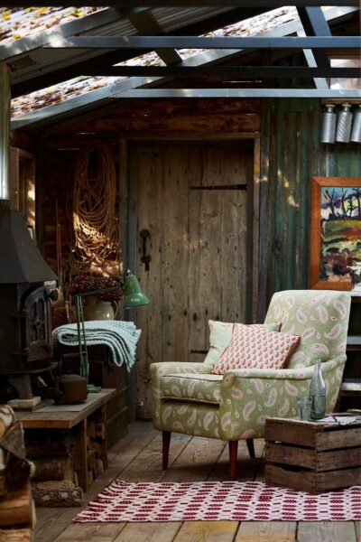 Cosy armchair in cabin scene