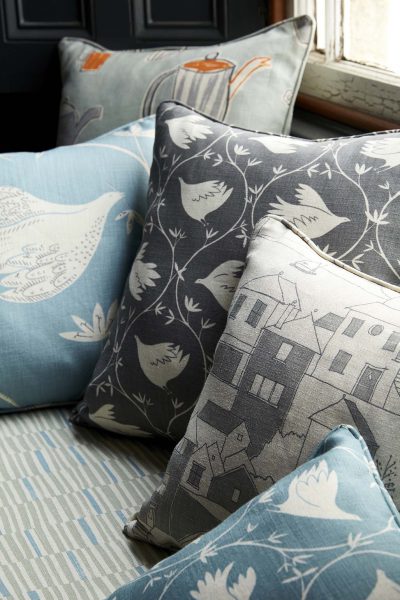 fabric covered cushions in grey and blue