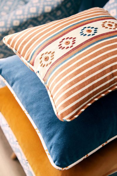 fabric covered blue, yellow and stripe cushions