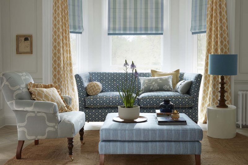 curtains and fabrics in bay window living room