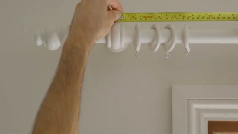 measuring the width of your curtain pole over the edge of your window recess