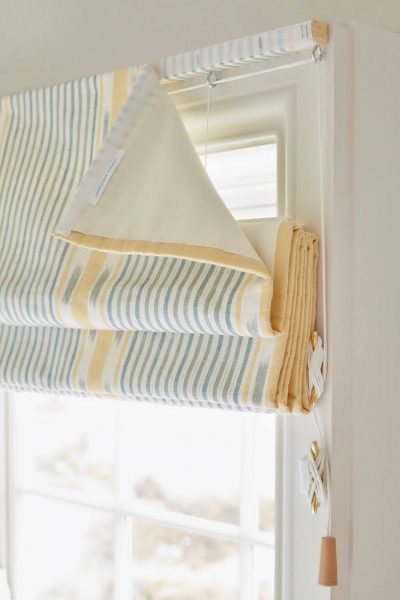 roman blind affixed to wooden batten
