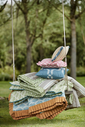 Patterned cushions on swing