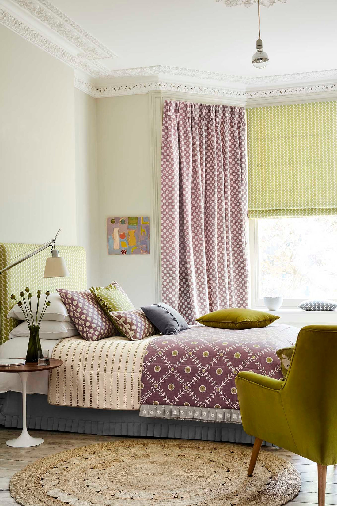 Bedroom with various patterned fabrics